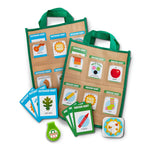 Children's educational activity set with cards and a bag on a white background