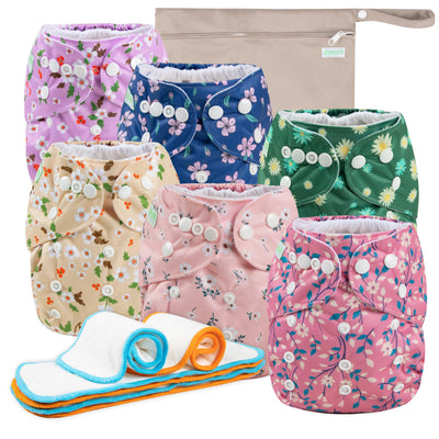 Set of colorful cloth diapers with floral patterns and a matching pouch on a white background.