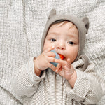Itzy Ritzy Silicone Teensy Teether – Flexible, Soft & Hollow Baby Teething Toy with Easy-to-Hold Handle – Designed for Ages 3 Months and Up (Hero Pop)