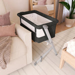 Dream On Me Skylar Bassinet and Bedside Sleeper, Adjustable Heights, Breathable Mesh Sides, Plush Mattress Pad, Wheels with Safety Locks & Tool-Free Assembly, Compact Fold & Travel Bag - Black