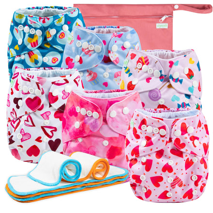 Colorful baby diapers with heart patterns and a pink pouch on a white background
