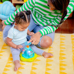Bright Starts Press & Glow Spinner Cause and Effect Musical Baby Toy, Age 6 Months+