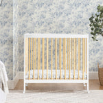 Delta Children Mia Portable Folding Mini Crib with 1.5-Inch Mattress - Greenguard Gold Certified, Bianca White/Natural