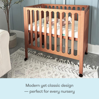Newton Baby Galileo Mini Crib Solid Beech Wood with Wheels in Chestnut Color, Mini Crib Mattress Included, Adjustable Mattress Height, Ultra-Safe Non-Toxic Finish