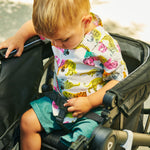 Munchkin Collapsible Wagon for Kids, Foldable, Ultra-Compact and Lightweight Stroller Wagon, All-Terrain Wheels, Adjustable Sun Canopy - Holds Up to 2 Passengers, Black