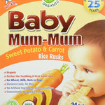 Box of Baby Mum-Mum Sweet Potato & Carrot Rice Rusks with a child eating a rusk on an orange background.